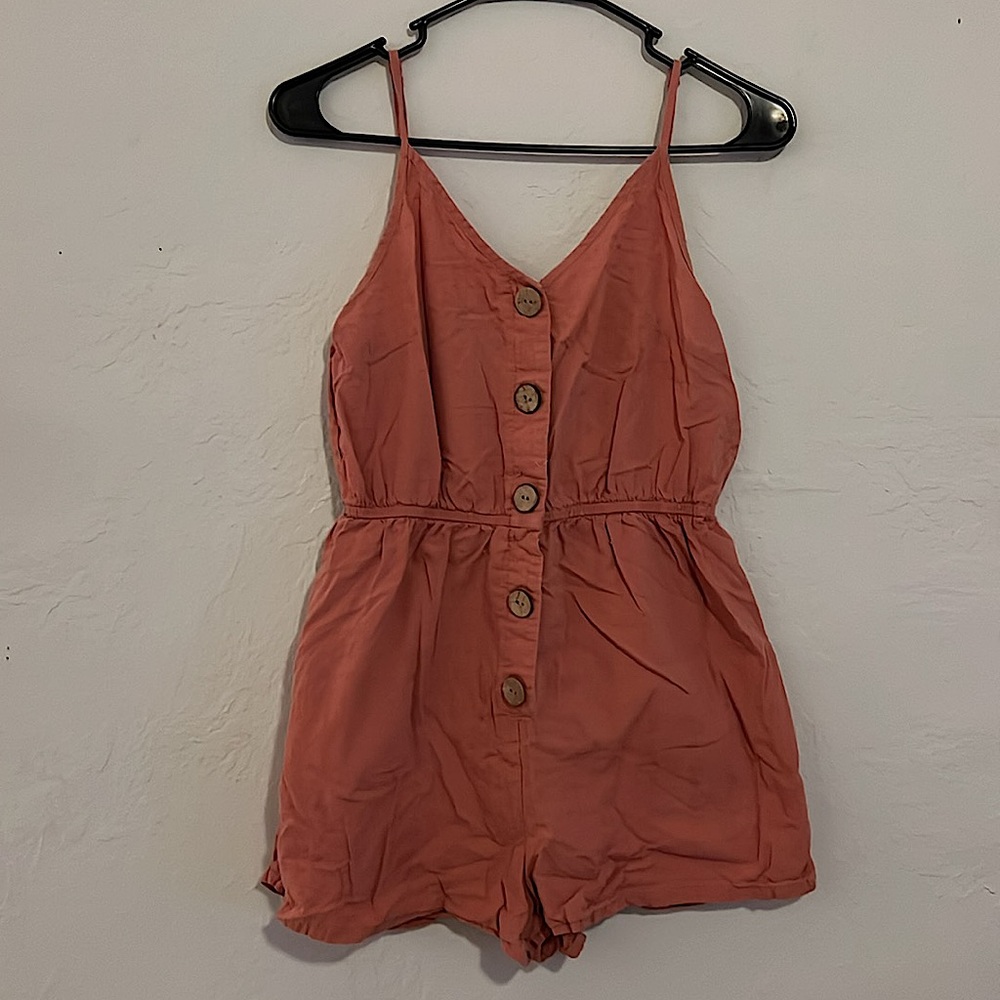Coral romper. Size Medium fits like a small